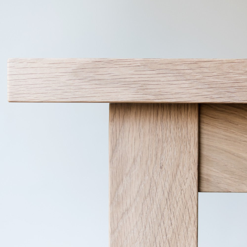 Close up of our Avon bench in British Prime Oak and a raw oiled finish