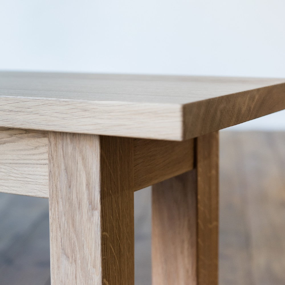 End frame and seat of our Avon bench in British Prime Oak and a raw oiled finish