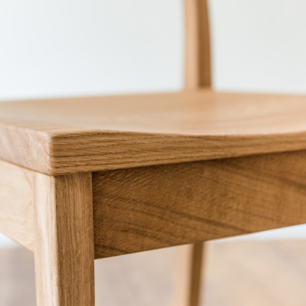 Close up of our Brampton low back in prime oak with clear oiled finish