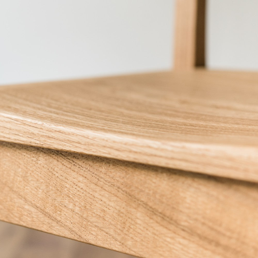 Close up of seat on our Brampton low back in prime oak with clear oiled finish