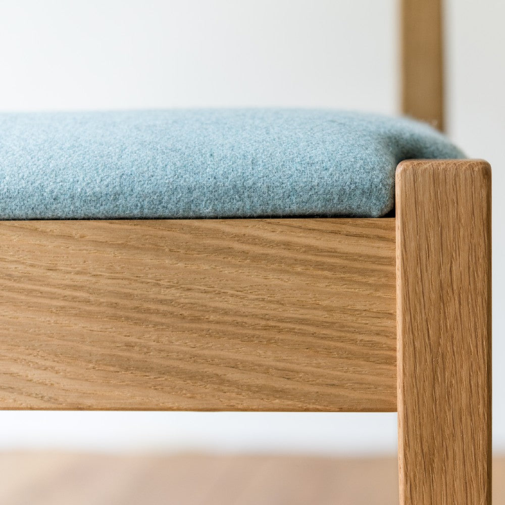 Upholstered seat on our Brampton chair in prime oak with clear oiled finish