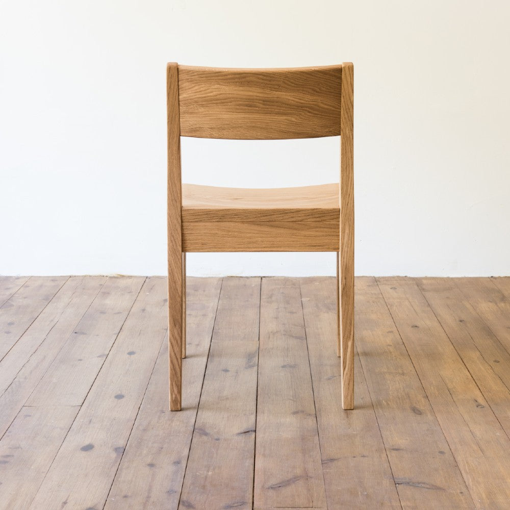 rear view of orpago hand made bespoke brampton kitchen dining lowback chair made from oak and a clear oiled finish