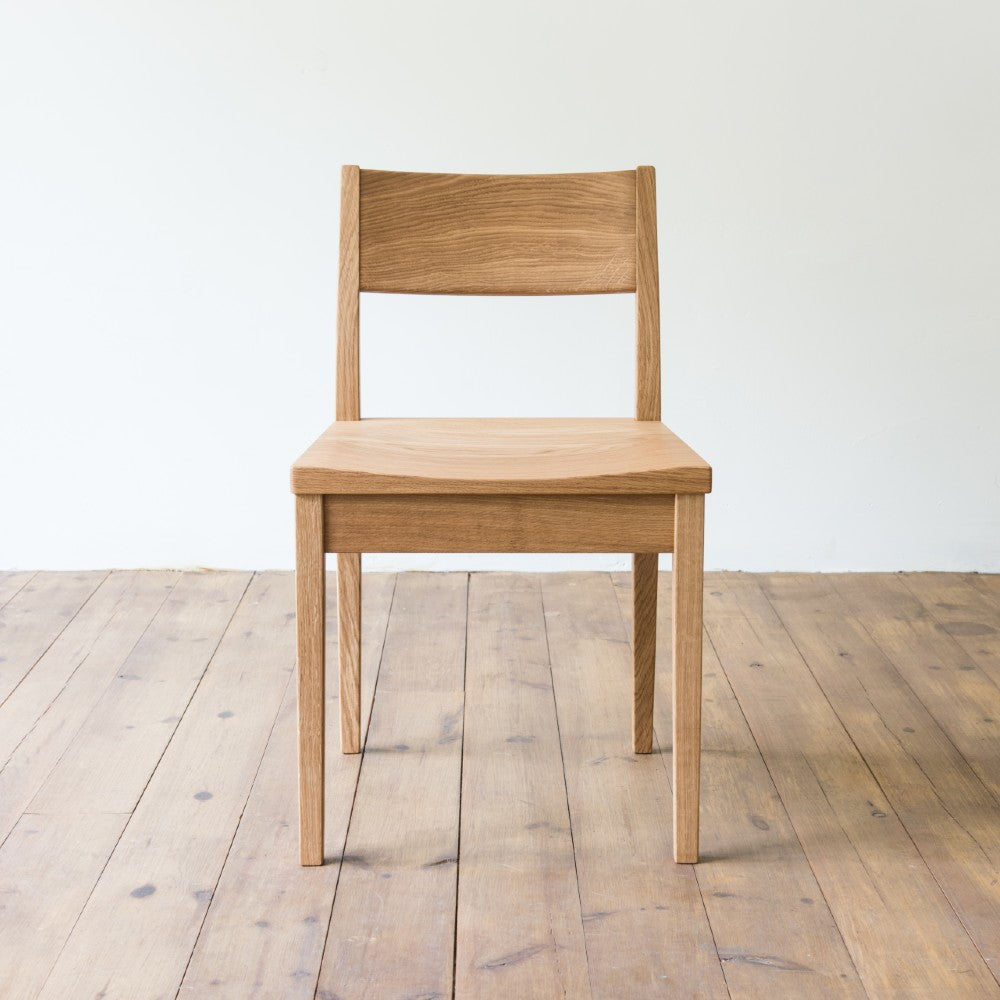 front view of orpago hand made bespoke brampton kitchen dining lowback chair made from oak and a clear oiled finish