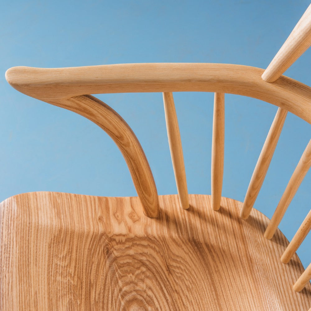 Steam bent arm with spindles on our Richmond armchair in ash with a clear satin oiled finish