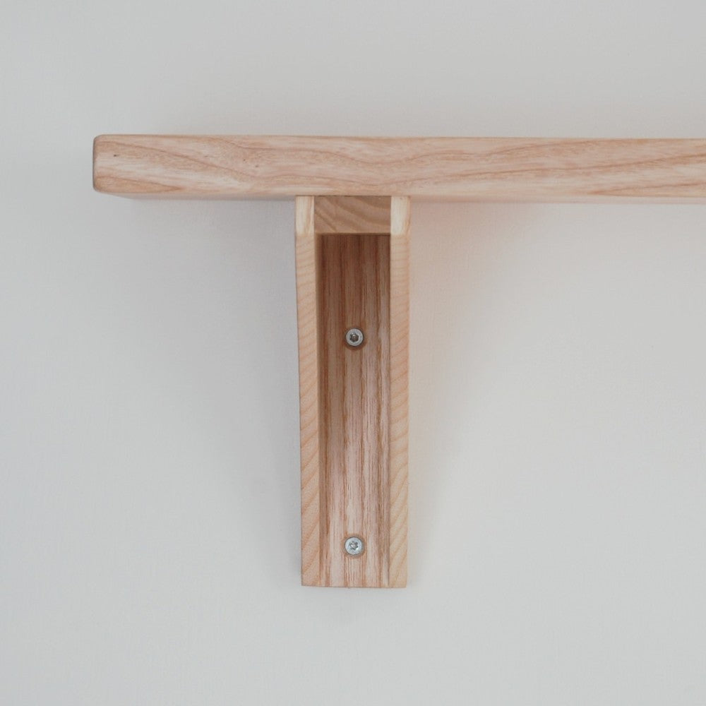 Front view of wooden bracket and shelf in british ash